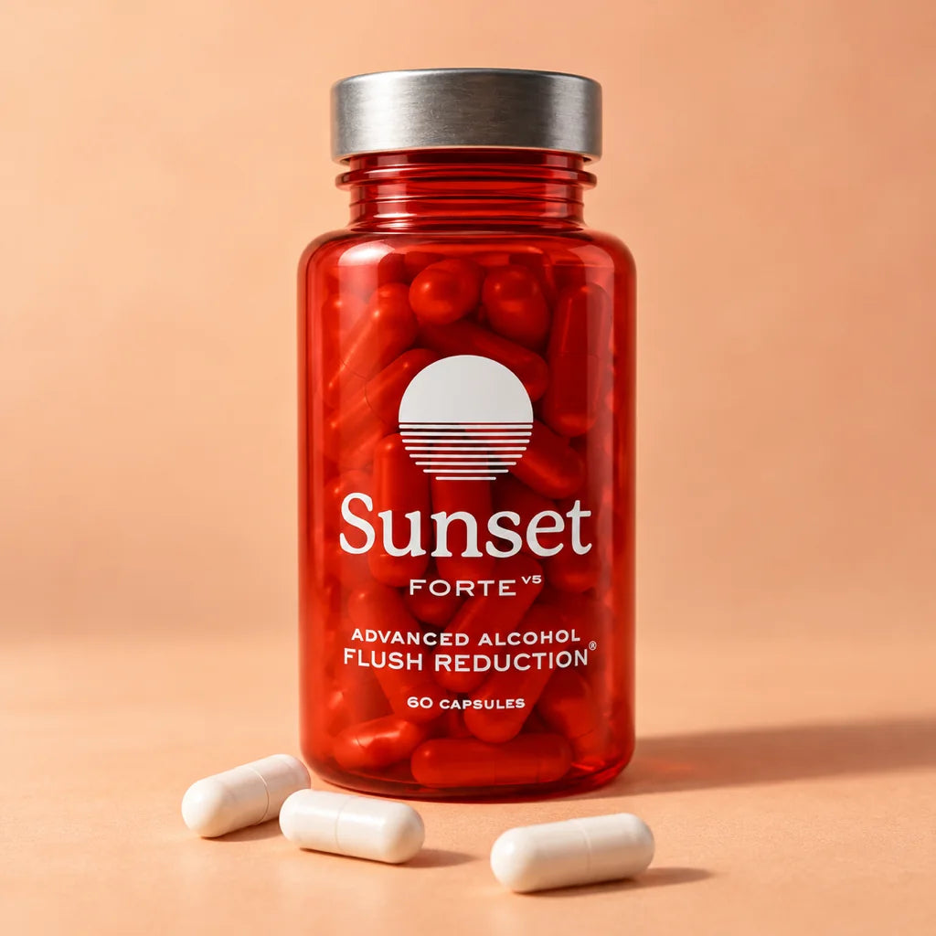 A bottle of Sunset Forte on a peach background with three white capsules in front of it